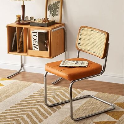 Giá tốt. Simple Comfortable Solid Wood Home Dining Chair Stainless Steel  Conference Cafe Rattan Leisure Chair trực tuyến